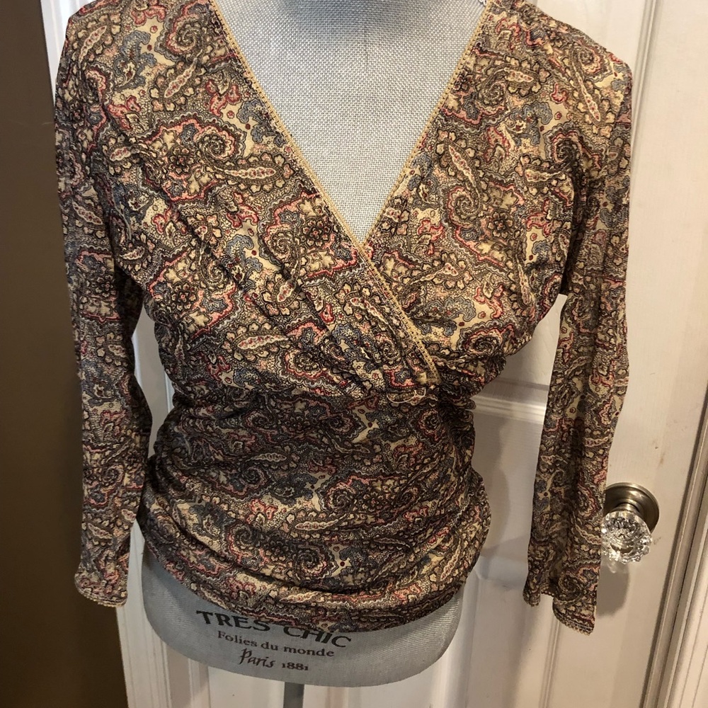 The limited top like new size Large